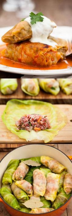 Russian Cabbage Rolls (Golubtsi) - Stuffed with extra lean beef, pork, rice, veggies and baked in a creamy tomato sauce. Comfort food at its best.