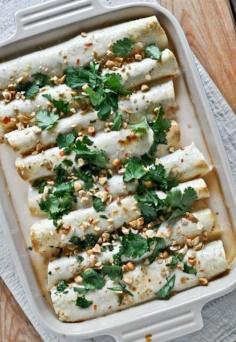 these Thai Chicken Enchiladas are one of the most popular recipes on my site. SO good! I howsweeteats.com