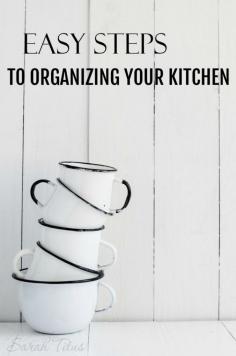 Does the thought of organizing your kitchen overwhelm you? If so, here's a step by step, detailed article showing you exactly how to tackle it once and for all!