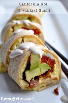 California Roll Breakfast- rolled up tortilla stuffed with bacon, eggs, cheese, tomato, avacodo; topped with a spicy sour cream.