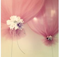 DIY..Balloon décor (tulle wrapped over balloons tied with ribbon and flowers).  Perfect for a princess party or bridal shower.