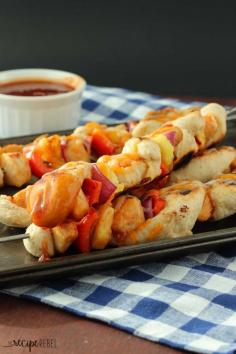 
                    
                        BBQ Chicken Pizza Kebabs: A grilled BBQ Chicken Pizza on a stick! Red pepper, pineapple, red onion, chicken and pizza dough all covered in pineapple brown sugar barbecue sauce, skewered and barbecued to smoky, grilled pizza perfection. www.thereciperebe...
                    
                