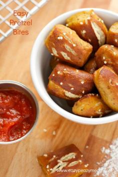 Soft buttery pretzel bites. Just like what you would get at the ball game. The perfect appetizer, snack, game day food. It is a soft, but chewy, crispy outside, pillowy inside, and oh so delicious. Easy Garlic Butter Soft Pretzel Bites - Eazy Peazy Mealz