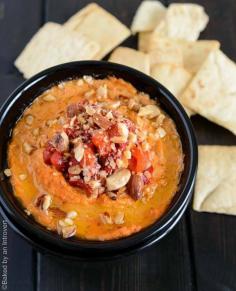 Thick and creamy hummus with lots of roasted red bell peppers and salted almonds. Serve this healthy dip with baked pita chips, slices of fresh pita, or your favorite vegetable. Since this Roasted Red Pepper Almond Hummus comes together in a snap, it’s the perfect make ahead snack for your summer adventures. #FlavorYourAdventure #ad @bluediamond