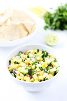 
                    
                        Cucumber Mango Salsa Recipe on twopeasandtheirpo... This fresh and simple salsa is great with chips, grilled chicken, or fish!
                    
                