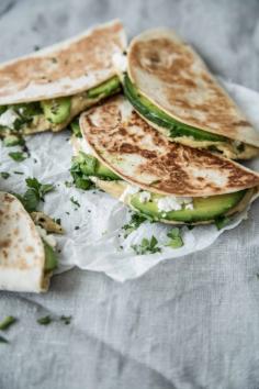 
                    
                        Quesadillas with feta, hummus and avocado.
                    
                