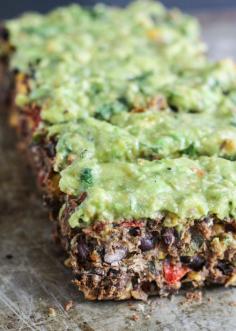 A meatless black bean 'meatloaf' packed with spices, cilantro, corn and topped with the creamiest 3-ingredient avocado sauce. #vegan #glutenfree
