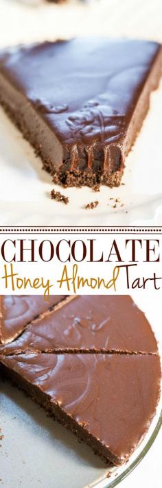 Chocolate Honey Almond Tart - A creamy, silky, smooth no-bake chocolate and honey filling over a chocolate graham cracker crust! Chocoholics: This easy, rich, and decadent tart will tame your fiercest cravings!!