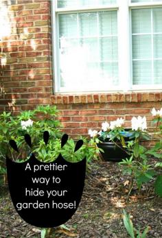 A pretty way to hide your garden house; much prettier than hose houses and easier to use! -Momo