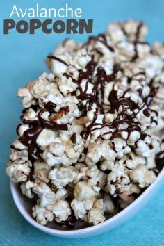 Avalanche Popcorn Recipe - a peanut buttery- coated popcorn drizzled with chocolate, from RecipeBoy.com