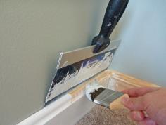 Trim painting trick (or edges in general). Wish I would've seen this before I did the nursery! So much easier than taping everything first!