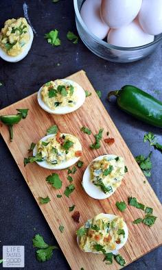 Jalapeno Popper Deviled Eggs | by Life Tastes Good. Can you imagine the goodness?! A deliciously tasty twist on Jalapeno Poppers loaded with cream cheese, fresh jalapeno, cheddar cheese, and BACON all stuffed into an edible dish you can eat with your hands! This might just be the perfect appetizer... #eggs #jalapeno #partyfood