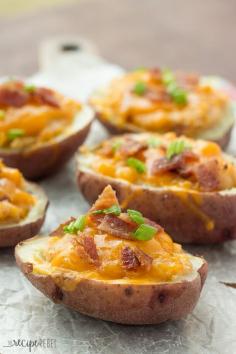 
                    
                        Grilled BBQ Bacon Twice Baked Potatoes: Tender potato shells stuffed with mashed potatoes flavored with barbecue sauce, bacon and cheddar cheese, and grilled to perfection! Microwaving the potatoes keeps things super easy and keeps the house cool in the summer. You can also bake them in the oven if you desire.
                    
                