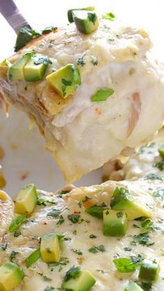 White Chicken Enchilada Casserole: "Stacked" White Chicken Enchiladas is simple to make, full of a cheesy chicken and white bean filling, and made with a lighter cream sauce. It's the perfect meal to serve to a group or prepare ahead of time for a weeknight dinner!