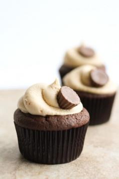 Peanut Butter Cup Cupcakes - Recipe includes  a peanut butter cup inside the chocolate cupcake!