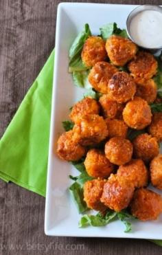 Buffalo Quinoa Bites are easy to make and a crowd-pleasing appetizer to serve at your next laid back get-together with pals! Serve with blue cheese or ranch dressing as a cool and crisp counterpart to the delicious buffalo spice! #vegetarian #recipe #vegan #recipes #healthy