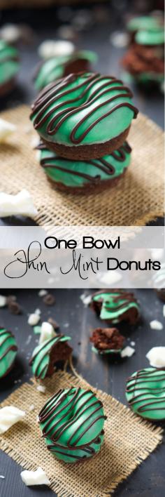 Your favorite Girl Scout Cookie just took over breakfast in these Mini Thin Mint Donuts! Tender chocolate donuts covered with mint white chocolate icing and a chocolate drizzle!