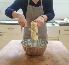 Use a bundt pan to reduce the mess of cutting corn off the cob / Mom's Kitchen Handbook