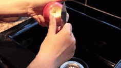 
                    
                        Peeling an apple all in one go.
                    
                