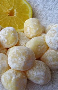 White Chocolate Lemon Truffles - The list of ingredients is minimal and the final product will dazzle you. The texture of these truffles are silky smooth. Hints of lemon ooze out of this velvety white chocolate. The best part is they are so easy to make. Melt all the ingredients together and cool for about two hours and you have yourself a delectable dessert that will impress everyone.. #delicious #recipe #cake #desserts #dessertrecipes #yummy #delicious #food #sweet