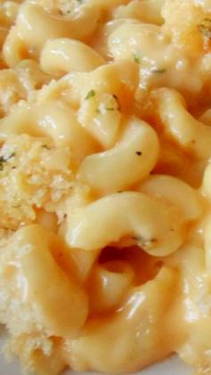 
                    
                        Home-Style Macaroni and Cheese ~ A Cheddar and cream cheese sauce with a touch of Dijon is mixed with macaroni pasta, topped with bread crumbs, and baked.
                    
                