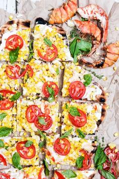 
                    
                        Grilled Lobster and Corn Pizza with Goat Cheese and Fresh Tomatoes
                    
                