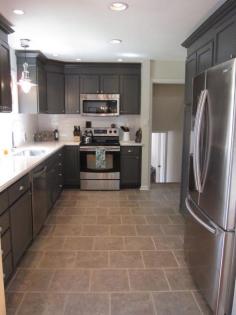 Great Colors: Charcoal Grey Cabinets, neutral floor tiles, white subway tile splash. Love the floor tile pattern