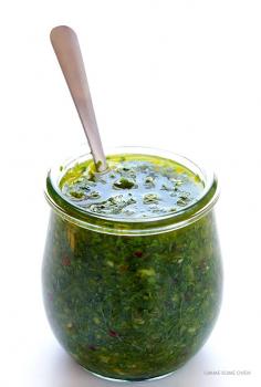 Chimichurri Sauce -- full of delicious fresh flavors, and it only takes minutes to make! | gimmesomeoven.com (Not sure why there is onion in the photos yet none in the recipe)