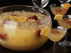 Christmas Mimosa Punch: Orange Juice, Ginger Ale, Grand Marnier and Champagne..