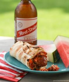 Grilled Italian Sausage Wraps - garlic - fresh basil - onion - shredded Asiago cheese - Dvina roasted tomatoes - 4 Italian sausages - mild or hot - 2 large flatbread