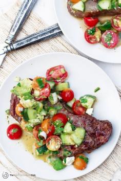 
                    
                        Strip Steak with Herbed Tomato Avocado Salad | The Mediterranean Dish. A strip steak cooked to perfectly medium and topped with an easy tomato and avocado salad with a mint-garlic vinaigrette. A simple meal never tasted better!
                    
                