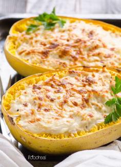 Greek Yogurt Chicken Alfredo Spaghetti Squash Boats - light and healthy comfort food without sacrificing the flavour. Gluten free.