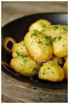 Baked Potatoes Recipe : baked in chicken broth, garlic and butter, SO GOOD! They get crispy on the bottom but stay fluffy inside and chocked full of flavor!