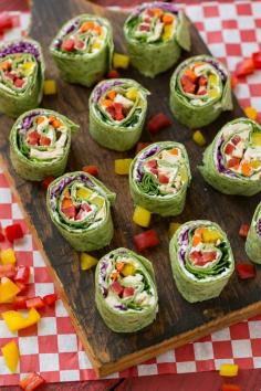Rainbow veggie pinwheels are made with homemade ranch spread and a variety of fresh veggies for a colorful and healthy lunch, snack or appetizer.