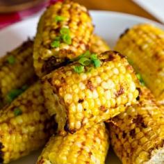 I was thinking since it's a camping theme we could do corn cooked in a cooler.