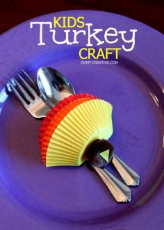 Have the kids make these Kids Thanksgiving Turkey Craft  then use it on the kids table Thanksgiving Day  |   OhMy-Creative.com