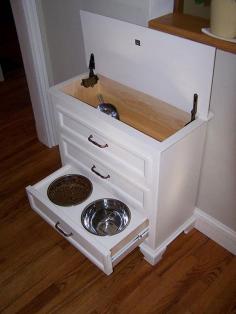 LOVE this idea!!  Made from small dresser. Pet food is kept in top with a scoop. Drawers hold all pet supplies, leash, collar, sprays, etc. with bowls integrated in the bottom drawer. I must have this! I am now officially on a hunt for a old dresser!