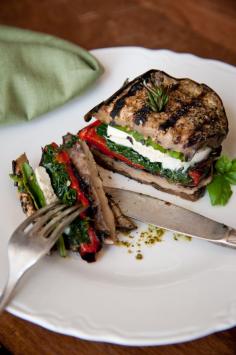 Grilled eggplant mozzarella stacks that include roasted red pepper, Portobello mushrooms, spinach, basil and drizzled with a bit of pesto olive oil be healthy www.bajadepesoya.areb2u.com