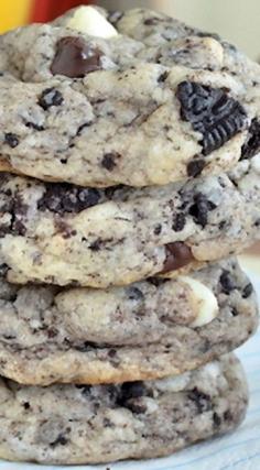 Cookies and cream chocolate chip cookies. 1 vanilla cake mix (15.25 oz.) 8 Tablespoons butter, melted 1 egg 1 teaspoon vanilla extract 4 ounces cream cheese, softened 2 cups Oreo cookie chunks 1/2 cup white chocolate chips 1/2 cup chocolate chips