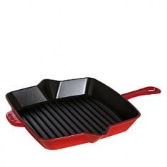 Griddles & Grill Pans - Durable cast-iron Staub square grill pan lets you enjoy authentic grilled flavor and healthier entrees, without firing up the grill. The natural heat-retentive properties of cast iron ensure food cooks evenly. Grill steaks, pork cutlets, seafood or hamburgers indoors, while draining away excess grease. This 10-inch grill pan elevates bacon, ensuring strips fry uniformly, without cooking in grease. With the black matte, slightly-textured enameled interior, this cast-iron stove top grill pan provides exceptional browning. The even-heating base, sidewalls and solid weight of this indoor grill pan allows searing at high temperatures to seal in moistness, flavor and add light-crisp texture. The Staub square grill pan makes restaurant-style panini sandwiches, Ruebens or grilled cheese sandwiches. Smooth enameled exterior in combination with the natural heat-retentive qualities of cast-iron creates durable, maintenance-free cookware, that does not require seasoning. The Staub 10-inch grill pan - Specifications Models: 1202923 (black), 1202987 (grenadine), 1202991 (dark blue), 1202906 (cherry), 1202918 (graphite) Material: enameled cast-iron 10" Sq. (16 3/4"L w/handles) x 1 3/4"H Base: 8 1/2" Sq. Weight: 7-lb, 6-oz. Made in France Care and Use Dishwasher-safe Oven-safe to 500 F and broiler-safe Suitable for gas, electric, glass, halogen and induction stove tops