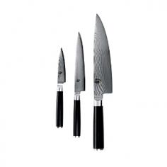 A generous gift for an avid cook, this Shun Classic 3-piece set is perfect for both novices and seasoned gourmets. Youâ ll find the core knives every kitchen needsâ 3Â&frac12;" paring, 6" utility, and 8" chefâ sâ presented in a beautiful storage box. Shun Classicâ s tasteful and contemporary design features beautiful Damascus-clad blades and D-shaped ebony pakkawood handles. Behind each knifeâ s beauty is function: a razor-sharp blade offering precision performance. Shun Classic knives feature a core of proprietary VG-MAX super steel clad on both sides with 34 layers of Damascus stainless steel. The woodgrain pattern of the steel allows the blade to slide easily through food. The result is a knife thatâ s sharp, durable and corrosion resistant, as well as beautiful to behold. NSF-certified knives meets the high-level safety standards for professional kitchens. CLASSIC 3-PIECE SET INCLUDES: 3Â&frac12;" PARING KNIFEIdeal for peeling, coring, trimming, decorating, and other detail work. Generally, youâ ll use this knife in your hand rather than against a cutting board, though paring knives can also be used for chopping small foods, such as garlic cloves. 6" UTILITY KNIFEGreat for a multitude of small tasks where more precise cuts are needed, such as trimming broccoli, green beans, or other smaller vegetables. The utility knife is sometimes called a sandwich knife because it works well on almost everything that goes into a sandwichâ from thin-skinned vegetables such as tomatoes, to meats and cheeses. 8" CHEFâ S KNIFEThis powerful kitchen multi-tasker is perfect for slicing, dicing, and chopping large quantities of fruits, vegetables, meats, and more. The wide blade keeps knuckles off the cutting board and is extra handy when transferring cut food from board to pan. Manufacturer: KAI USA Ltd. Includes: 3Â&frac12;" paring knife, 6" utility knife, 8" chefâ s knife, and presentation/storage box Material: Stainless steel blade, pakkawood handle Care: Hand wash only Warranty: Limited lifetime warranty Handcrafted in Seki City, JapanFree sharpening on all Shun cutlery for as long as you own it.