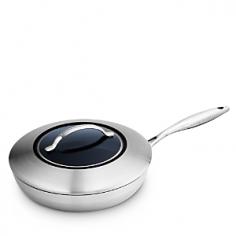 Scanpan CTX - 11 Covered Saute Pan - 65102800 - The SCANPAN CTX 11 Covered Saute Pan uses the best 5 ply clad stainless steel with SCANPAN's exclusive Ceramic Titanium non-stick internal finish. SCANPAN CTX cookware is oven safe to 500F with rapid and even heat distribution and is PFOA free. Designed and made in Denmark, the CTX range's clever design means there are no dirt collecting edges and the cast stainless steel handle is secured with rivets. There are a number of accessory options available to make your cooking experience with SCANPAN even more enjoyable.