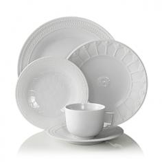 Michael Aram 5-Piece Palace Dinnerware Place Setting Details Dinnerware made of Limoges porcelain. Dishwasher and microwave safe. Includes 11"Dia. dinner plate, 8.75"Dia. salad plate, 7"Dia. tidbit plate, 4"Dia. x 3"T breakfast cup, and 6.75"Dia. saucer. Imported. Designer About Michael Aram: American artist Michael Aram studied art in New York in the late 1980s before traveling to India on an inspirational journey, where he discovered a rich metalworking tradition that inspired his turn toward handcrafted design. Michael Aram established a home and workshop in New Delhi, where he began crafting objects ranging from tableware to furniture, all of which reflect the hand of the artisan. The tension of line, form, and meaning is a distinguishing characteristic of Aram's extraordinary designs, inspiring thoughtful appreciation and bringing a sense of ceremony in their day-to-day use. Each Michael Aram piece is handmade, so no two items are exactly alike. Color: WHITE. Material: LIMOGES PORCELAIN.