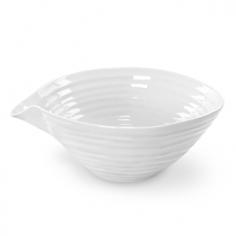 Made of sturdy porcelain. Modern, organic rim styling and ridges. Perfect for whisking eggs or serving side dishes. Microwave- and dishwasher-safe. Dimensions: 10L x 8W x 5H inches. Designed for a multitude of uses, the Sophie Conran White Pouring Bowl with Snip is a must-have for every kitchen. Safe for the freezer, microwave, oven and dishwasher, this durable porcelain bowl can go from prep to leftovers in a snap. You'll love its versatility. About PortmeirionStrikingly beautiful, eminently practical, refreshingly affordable. These are the enduring values bequeathed to Portmeirion by its legendary co-founder and designer, Susan Williams-Ellis. Her father, architect Sir Clough Williams-Ellis, was the designer of Portmeirion, the North Wales village whose fanciful architecture has drawn tourists and artists from around the world (including the creators of the classic 1960s TV show The Prisoner). Inspired by her fine arts training and creation of ceramic gifts for the village's gift shop, Susan Williams-Ellis (along with her husband Euan Cooper-Willis) founded Portmeirion Pottery in 1960. After 50+ years of innovation, the Portmeirion Group is not only an icon of British design, but also a testament to the extraordinarily creative life of Susan Williams-Ellis. The style of Portmeirion dinnerware and serveware is marked by a passion for both pottery manufacturing and trend-setting design. Beautiful, tactile, nature-inspired patterns are a defining quality of Portmeirion housewares, from its world-renowned botanical designs modeled on antiquarian books to the breezy, natural colors of its porcelain and earthenware. Today, the Portmeirion Group's design legacy continues to evolve, through iconic brands such as Spode, the Pomona Classics collection, and the award-winning collaboration of Sophie Conran for Portmeirion. Sophie Conran for Portmeirion: Successful collaborations have provided design inspiration throughout Sophie Conran's life. Her father, designer Sir Terence Conran, and mother, food writer Caroline Conran, have been the pillars of her eclectic mix of cooking, writing, and interior design. In pairing with the iconic British housewares brand Portmeirion, Conran has created another successful collaboration: Sophie Conran for Portmeirion, an award-winning collection of dinnerware, serveware, and drinkware for the practical, multi-functional needs of contemporary kitchens. Launched in 2006, Sophie Conran for Portmeirion immediately received the Elle Deco Style Award for Best in Kitchens, and two years later, the House Beautiful Award for Best in Tableware. The soulful, tactile beauty of these oven-to-tableware pieces is exemplified by rippled surfaces and edges that evoke a potter's hand. This down-to-earth style is complemented by charming pastels, gentle earth tones, and classic whites and pinks, for a collection that will lighten and enliven contemporary kitchen decors. Though delicate to the eye and touch, these plates and bowls are built for durable performance, with microwave- and dishwasher-safe porcelain that's casual enough for breakfast and elegant enough for eye-catching dinners.
