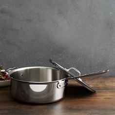 This All-Clad stainless-steel saute pan is wide and deep to provide ample room for food movement, with a flat bottom to slide smoothly back and forth on a burner. Straight sides provide the surface area necessary to sear or braise, with the durability of tri-ply construction to finish a dish in the oven or broiler. Lid circulates moisture and keeps in nutrients, cooking on a stove top or in the oven, and helper handle makes it easy to lift when full. The All-Clad saute pan allows cooking foods in a small amount of oil or butter while continuously tossing or stirring. This deep saute pan is also ideal to deglaze. The exceptional even-heating qualities of All-Clad cookware produces gourmet results. The All-Clad stainless-steel collection of cookware for ultimate cooking convenience features redesigned ergonomic handles and All-Clad brand and measurement/capacity on the underside of each pan for easy identification. High-strength, noncorrosive stainless-steel rivets secure handles permanently for safe cooking. All-Clads leading cookware line is brilliantly styled with a hand-polished gleaming stainless-steel finish that many of the worlds professional and home chefs prefer. The 18/10 stainless-steel interior will not react with food, leaving the pure taste you desire. Magnetic exterior is perfect for all cooktops, including induction. Oven- and broiler-safe. Dishwasher-safe. Lid and pan made in the USA.