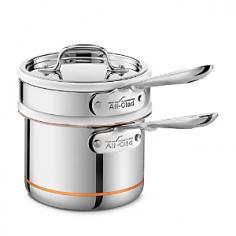 Delicate ingredients of cheese, chocolate, crÃ mes and sauces go perfectly with this patented five-ply bonded double boiler. The copper center core of the 2-qt. saucepan is bonded to aluminum to enhance heat distribution and conductivity, and reduce weight. Durable stainless steel exterior and cooking surface provide even cooking, ease of cleaning and aesthetic appeal. The double boiler insert is made of high-quality white porcelain that prevents burning or scorching. Includes two lids: one for the saucepan and one for the insert. Oven safe to 500Â&deg;F. Made in the USA.