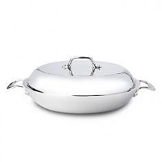 Braisers & Paella Pans - This braiser is terrific for pot roast, osso buco or bean dishes and braised vegetables. Designed for slow cooking in a small amount of liquid, it has a wide, flat bottom for quick browning, sloped sides to concentrate the cooking liquid, and a domed lid to capture flavor and nutrients. With low-profile, space-efficient loop handles, this beautiful braiser can go from stove top to oven to table. The All-Clad stainless-steel collection of cookware for ultimate cooking convenience features redesigned ergonomic handles and All-Clad brand and measurement/capacity on the underside of each pan for easy identification. Lids made in the USA. All-Clad's leading cookware line is brilliantly styled with a hand-polished gleaming stainless-steel finish that many of the world's professional and home chefs prefer. The 18/10 stainless-steel interior will not react with food, leaving the pure taste you desire. Magnetic exterior is perfect for induction cooktops. Made in the USA. Product Features 3-ply bo - Specifications Model 8701004441 13" Dia. (16 3/4" w/handles) x 2 1/2"H (5 1/2" w/lid) Base: 8 3/4" Dia. Weight: 5-lb. Made in the USA Lifetime manufacturer warranty All-Clad Cookware Lifetime Warranty: From date of purchase, All-Clad guarantees to repair or replace any item found defective in material, construction or workmanship under normal use and following care instructions. This excludes damage from misuse or abuse. Minor imperfections and slight color variations are normal. Care and Use Dishwasher-safe Before using for the first time, wash in hot, soapy water with a sponge or dishcloth. Rinse in hot water and dry thoroughly. Placing pots on low heat for one or two minutes before adding foods. Preheat pot or pan for one to two minutes over low or medium heat. To avoid the formation of small white dots or pits, bring liquids to a boil before adding salt, then stir well. Or, add salt after food has started to co