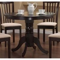 Brannan Round Pedestal Dining Table - Cappucino by Coaster 101081. With relaxed elegance, this round pedestal table will make a charming addition to your breakfast nook or casual dining room. The delicate carved detail and generous curves of this single pedestal offer graceful designs. Arrange with matching upholstered side chair to add a touch of contemporary flair. Available in a cappucino finish. Space saver: Helps to utilize space more effectively. Specification This item includes: CO-101081 Brannan Round Pedestal Table 40 Dia x 30H Please refer to the Specifications to determine what items are included since sometimes the image shows more or less items. If you are not sure, please contact us and our customer service will be glad to help.