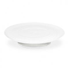 Durable porcelain construction. Strong and durable yet lightweight. Modern, organic rim styling and ridges. Microwave- and dishwasher-safe. Dimensions: 9.8 diam. x 4.2H inches. Proudly display your freshly baked cakes and pies with the Sophie Conran White Footed Cake Plate - 12.5 diam. in. This porcelain piece is simple in design, yet sturdy in construction and is the perfect way to show off your baking talents. It's safe for the freezer, microwave and oven, and cleans up easily in the dishwasher. About PortmeirionStrikingly beautiful, eminently practical, refreshingly affordable. These are the enduring values bequeathed to Portmeirion by its legendary co-founder and designer, Susan Williams-Ellis. Her father, architect Sir Clough Williams-Ellis, was the designer of Portmeirion, the North Wales village whose fanciful architecture has drawn tourists and artists from around the world (including the creators of the classic 1960s TV show The Prisoner). Inspired by her fine arts training and creation of ceramic gifts for the village's gift shop, Susan Williams-Ellis (along with her husband Euan Cooper-Willis) founded Portmeirion Pottery in 1960. After 50+ years of innovation, the Portmeirion Group is not only an icon of British design, but also a testament to the extraordinarily creative life of Susan Williams-Ellis. The style of Portmeirion dinnerware and serveware is marked by a passion for both pottery manufacturing and trend-setting design. Beautiful, tactile, nature-inspired patterns are a defining quality of Portmeirion housewares, from its world-renowned botanical designs modeled on antiquarian books to the breezy, natural colors of its porcelain and earthenware. Today, the Portmeirion Group's design legacy continues to evolve, through iconic brands such as Spode, the Pomona Classics collection, and the award-winning collaboration of Sophie Conran for Portmeirion. Sophie Conran for Portmeirion: Successful collaborations have provided design inspiration throughout Sophie Conran's life. Her father, designer Sir Terence Conran, and mother, food writer Caroline Conran, have been the pillars of her eclectic mix of cooking, writing, and interior design. In pairing with the iconic British housewares brand Portmeirion, Conran has created another successful collaboration: Sophie Conran for Portmeirion, an award-winning collection of dinnerware, serveware, and drinkware for the practical, multi-functional needs of contemporary kitchens. Launched in 2006, Sophie Conran for Portmeirion immediately received the Elle Deco Style Award for Best in Kitchens, and two years later, the House Beautiful Award for Best in Tableware. The soulful, tactile beauty of these oven-to-tableware pieces is exemplified by rippled surfaces and edges that evoke a potter's hand. This down-to-earth style is complemented by charming pastels, gentle earth tones, and classic whites and pinks, for a collection that will lighten and enliven contemporary kitchen decors. Though delicate to the eye and touch, these plates and bowls are built for durable performance, with microwave- and dishwasher-safe porcelain that's casual enough for breakfast and elegant enough for eye-catching dinners.