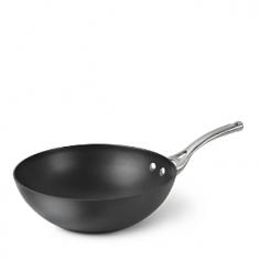 10-inch nonstick stir fry pan. Heavy-gauge, hard-anodized aluminum. Cast stainless steel loop handle. Dishwasher safe for easy cleanup. Oven safe to 450 degrees Fahrenheit. Manufacturer's full lifetime warranty. Sized just right for dinner for two, the Calphalon Contemporary Nonstick 10 in. Stir Fry Pan is specially shaped so it's easy to toss, turn, and stir food. The nonstick surface is multi-layer, PFOA-free, and even dishwasher safe. Plus, the body is made of heavy-gauge, hard-anodized aluminum for even heating, and has a handle made of durable cast stainless steel. Oven safe up to 450 degrees Fahrenheit. Includes manufacturer's lifetime warranty. About CalphalonCalphalon's mission is to be the culinary authority in kitchenwares, enhancing the home chef's food experience during planning, prep, cooking, baking, and serving. Based in Toledo, Ohio, Calphalon is a leading manufacturer of professional quality cookware, cutlery, bakeware, and kitchen accessories for the home chef. Calphalon is a Newell-Rubbermaid company. Calphalon's goal is to give you, the home chef, all the tools you need to realize your highest potential in the kitchen. From your holiday roasting pan to your everyday fry pan, count on Calphalon to be your culinary partner - day in and day out, for breakfast, lunch, and dinner for a lifetime.